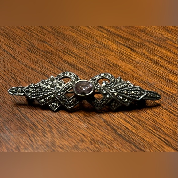 Jewelry - Vintage Marquisite brooch. Silver with amethyst stone